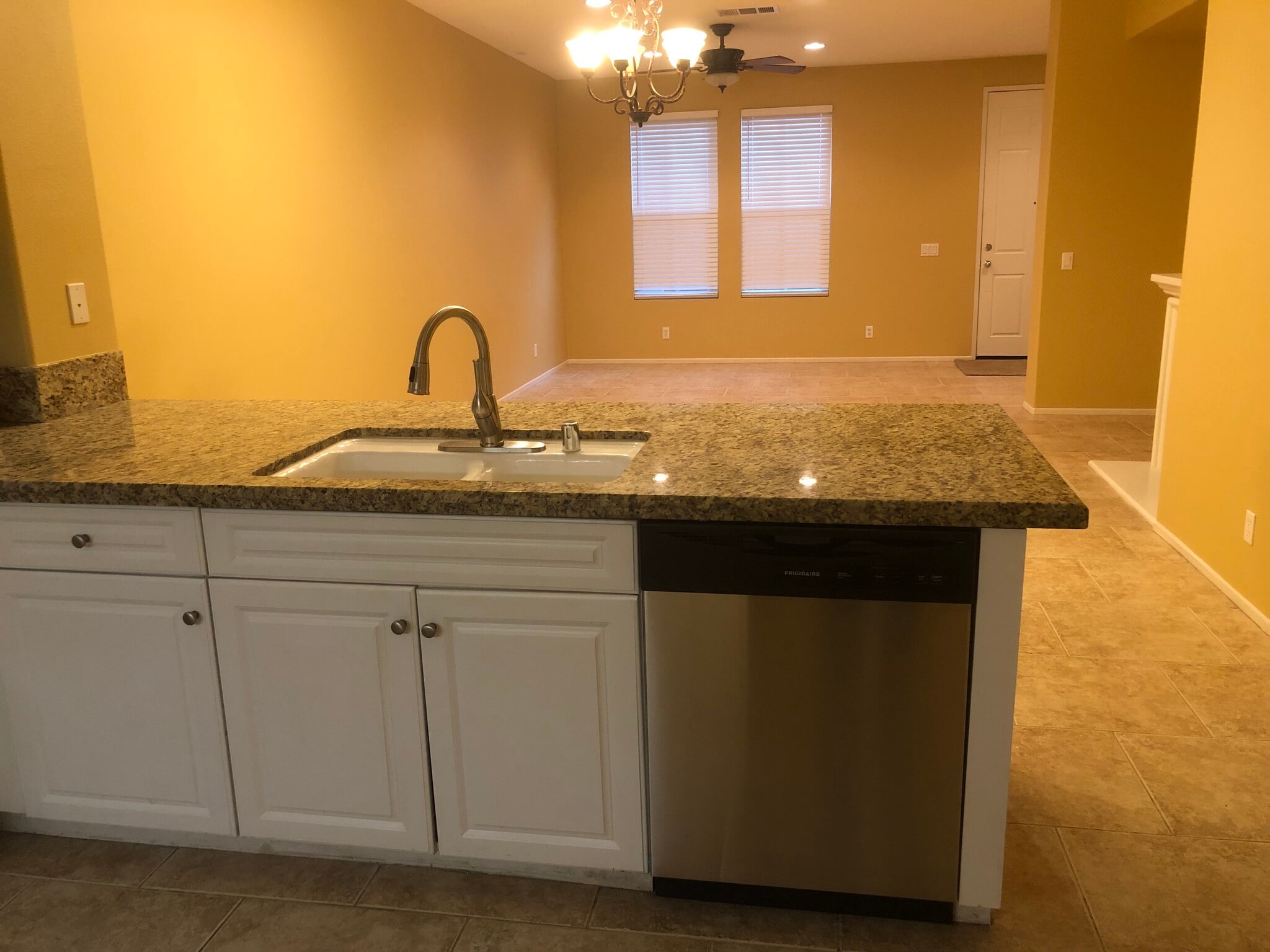 Open kitchen attached to dinning ,living room area . - 6395 Delgado Ln