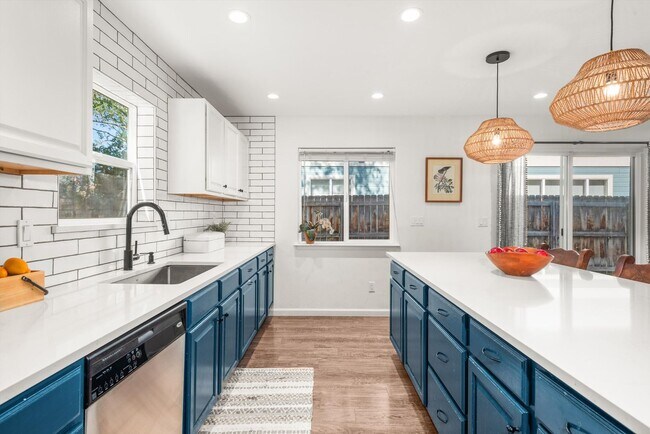 Building Photo - Prime Location | Spacious 4BD Home with El...