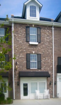Building Photo - Located just Steps from Shopping, Dining, ...