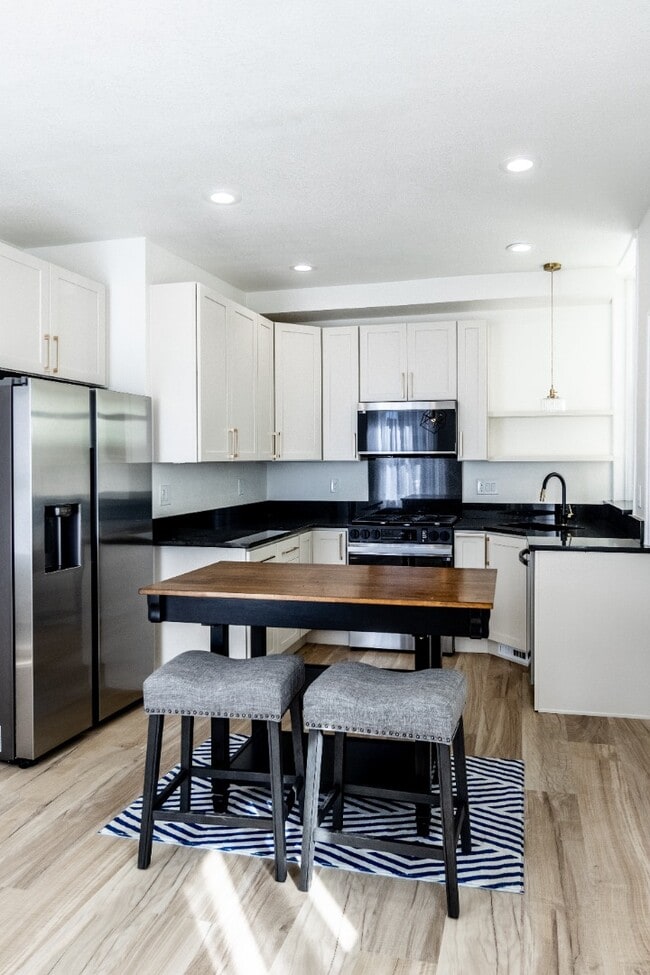 Building Photo - Stunning Remodeled Patio Home in Baker – 3...