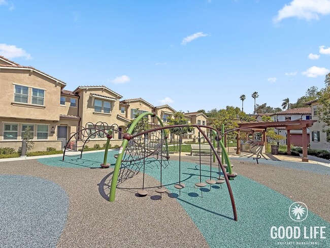 Building Photo - Bright 3BD/2.5BA Townhouse in Vista with Community Pool, In-Unit Laundry & 2-Car Garage