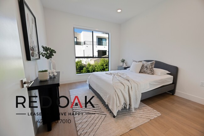 Building Photo - Modern Two Bedroom Featuring an Expansive ...