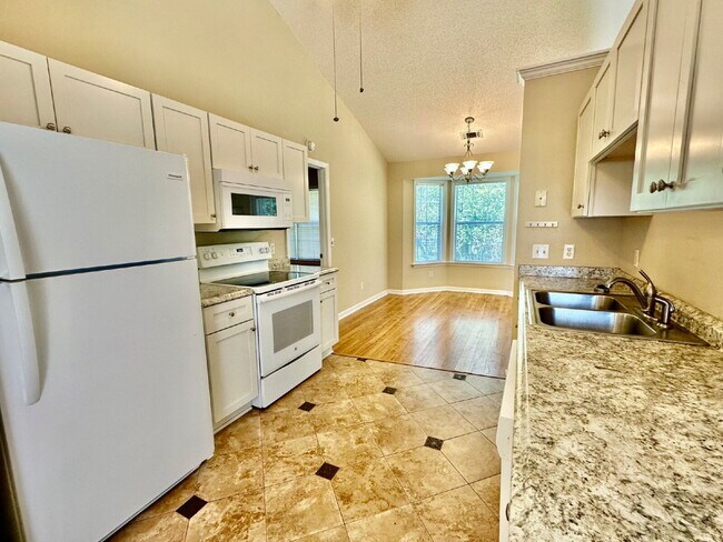 Building Photo - Rivers End Three Bedroom Home with a Fence...