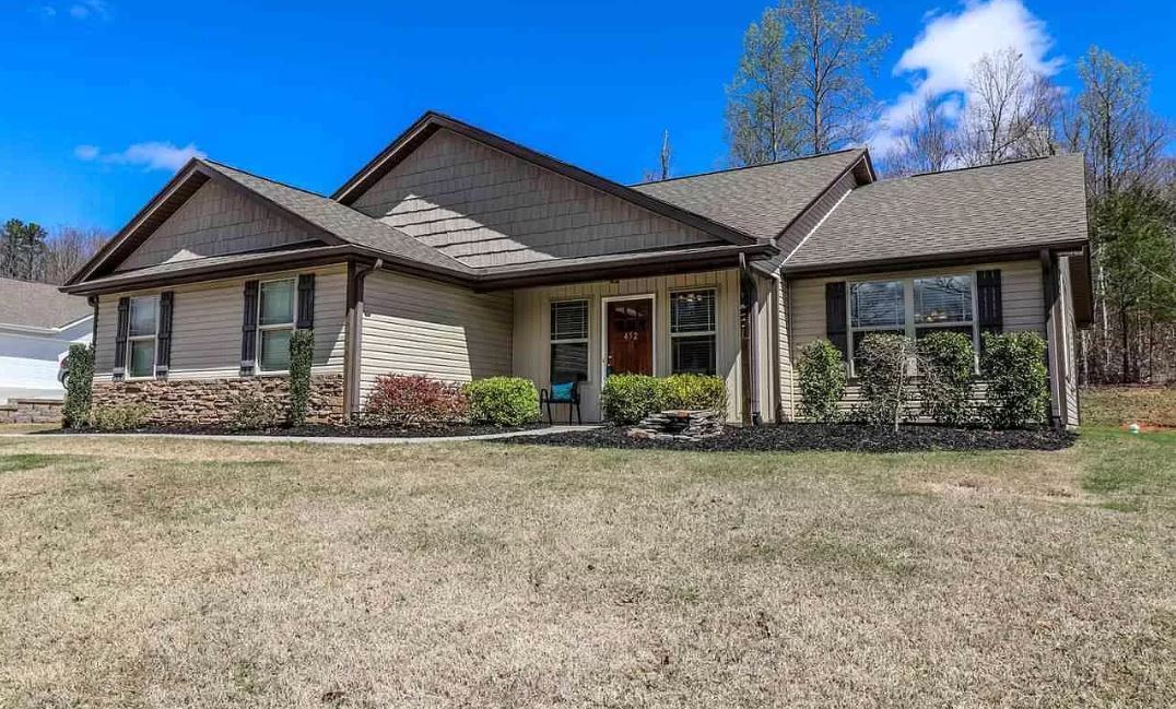 Tastefully landscaped with a cozy front porch - 452 Bowers Rd