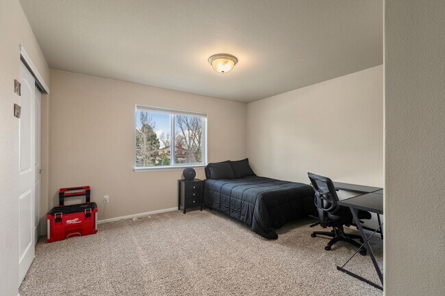 Building Photo - Spacious 4-Bedroom Home with Private Backy...