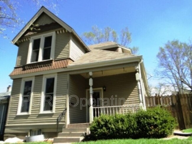 Building Photo - 1009 N 49th Ave
