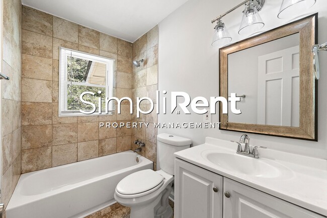 Building Photo - PRICE REDUCED! 1st month's Rent FREE with a 13-month lease!