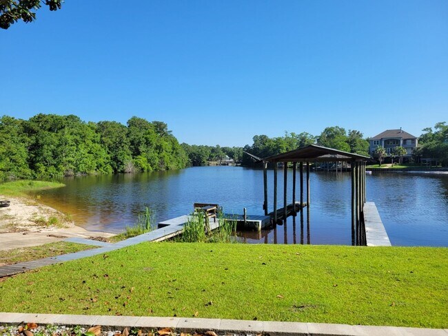Building Photo - Riverfront Living with Private Boat Launch