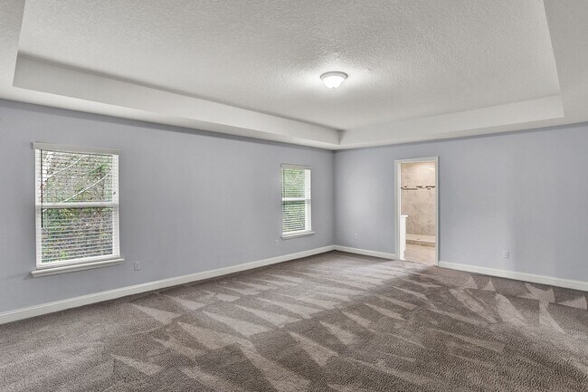 Building Photo - Beautiful 5/4 Home with Over 4k sqft, Fenced in Yard & 3 Car Garage! Pet friendly!