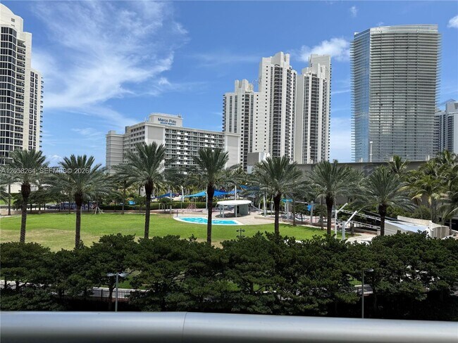 Building Photo - 19370 Collins Ave