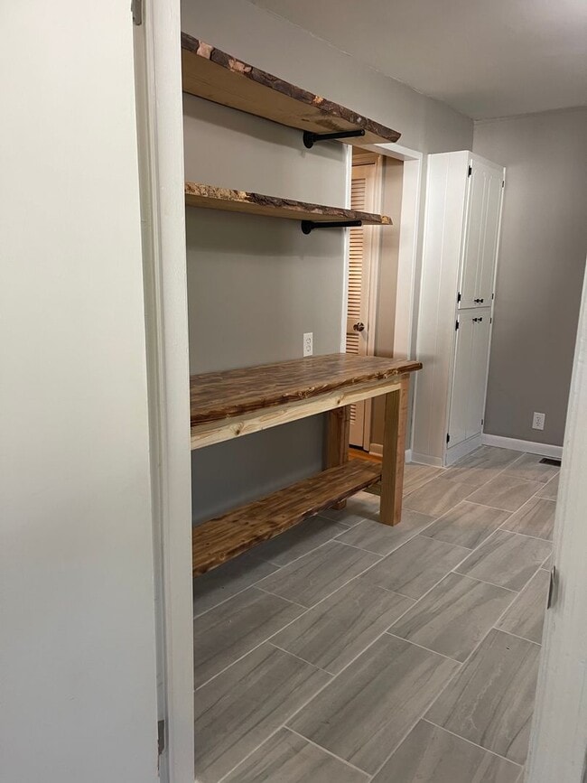 Building Photo - Beautifully renovated Normaltown 3/2 Home with fenced in front yard! Water, trash, and lawncare i...