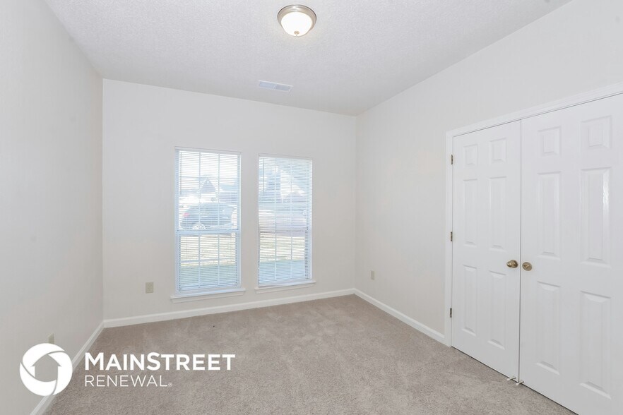 Building Photo - 6650 Spencer Forest Cove W