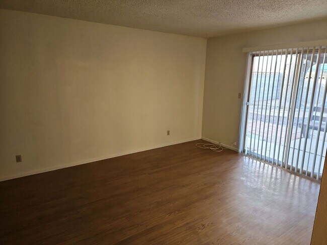 Building Photo - Spacious 4-Bedroom Home with Large Backyard & Covered Patio!