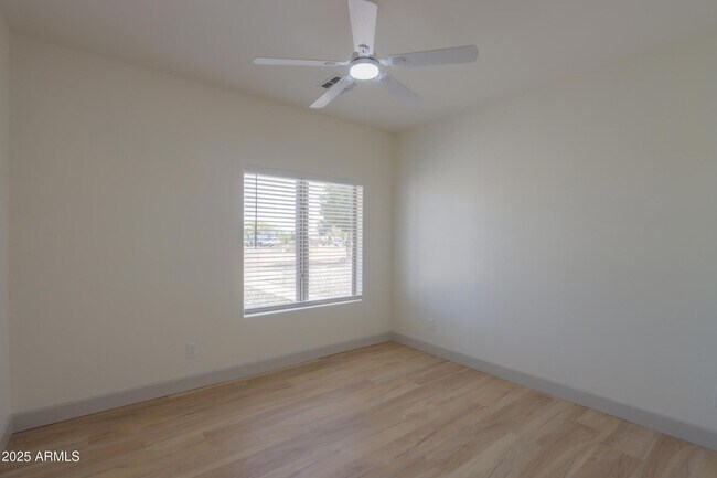 Building Photo - 10692 E American Pride Dr
