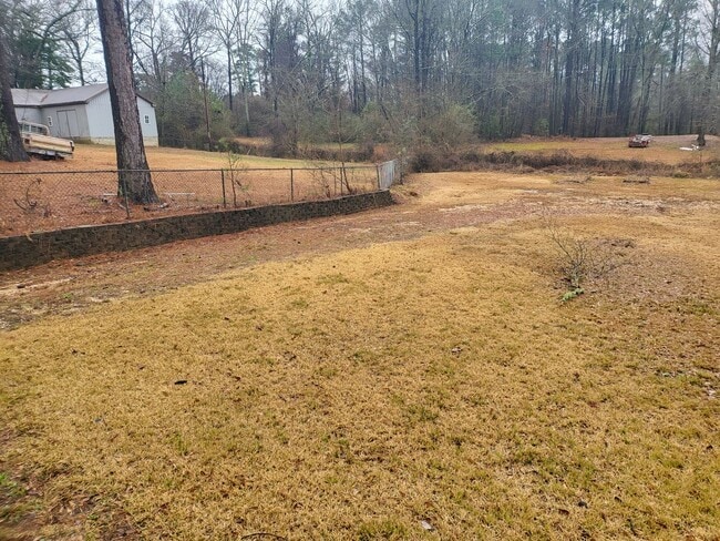 Building Photo - 3 bedroom, 2 bath - with a huge backyard and a walk in basement