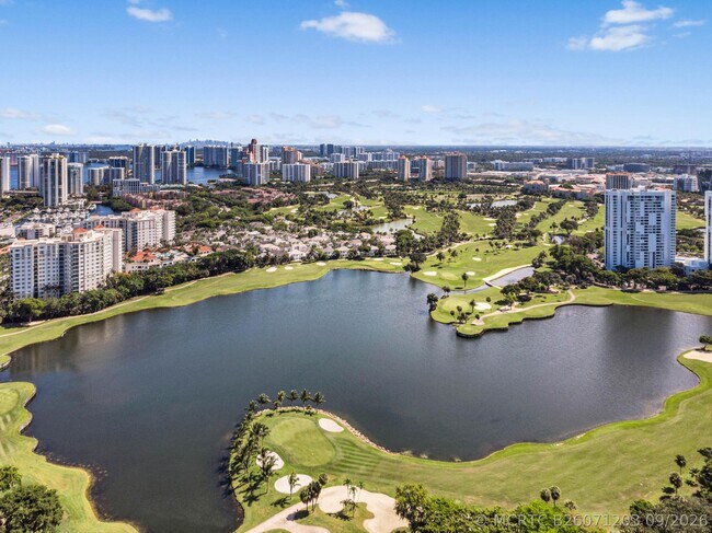 Building Photo - 3701 N Country Club Dr
