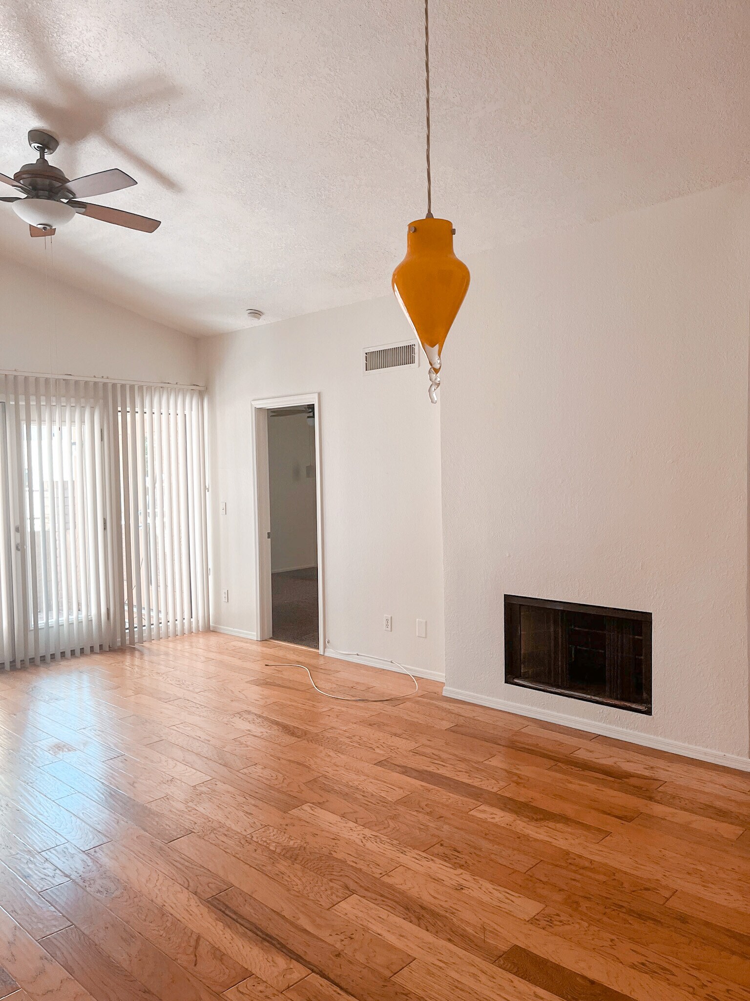 Living/Dining Area with fireplace and Master Bedroom door - 1915 N Scovel St