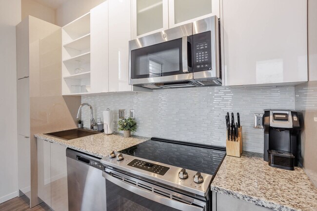 Building Photo - 9-JAN-JAN E 4th St