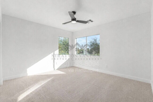 Building Photo - 1005 E Stirrup Ln