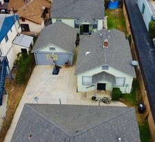 Building Photo - 1045 W Vernon Ave