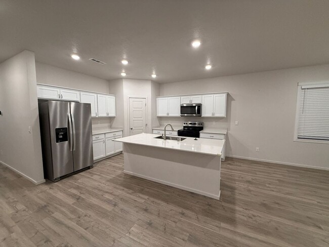 Building Photo - New Construction 4 Bed Mead School District Rancher w/ Fully-Fenced Yard and Attached Garage!