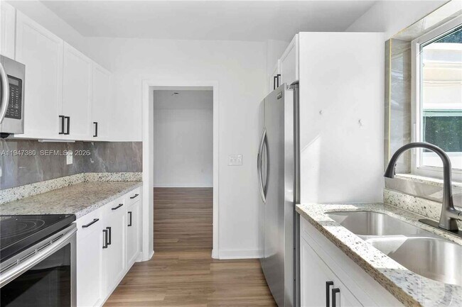 Building Photo - Southwest 26th Street, Miami, FL 33133 - 3 BR 2 BA single-family home