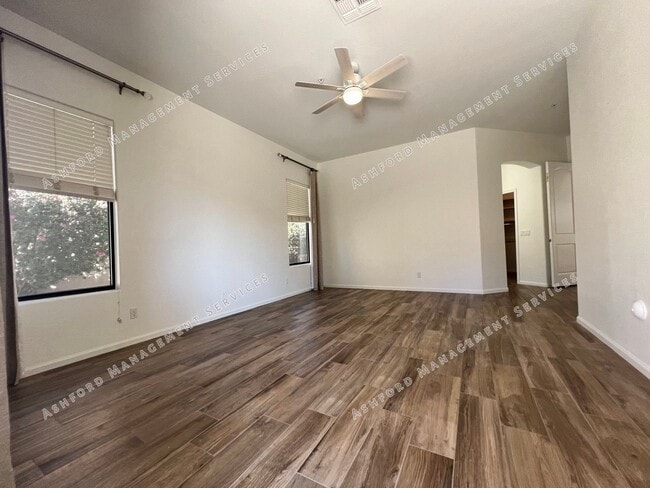 Building Photo - COME HOME TO LUXURY IN GATED GRAYHAWK GOLF...
