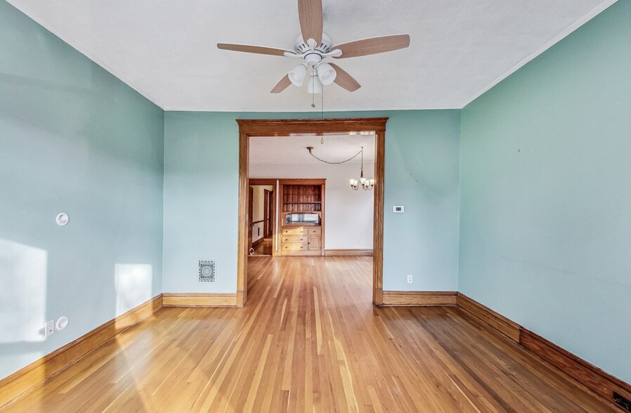 Reverse view of living room and into dining room - 3747 N Kostner Ave