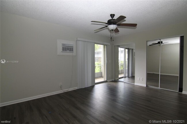 Building Photo - 1 br, 1 bath Condo - 151 SW 135th Ter Apt ...