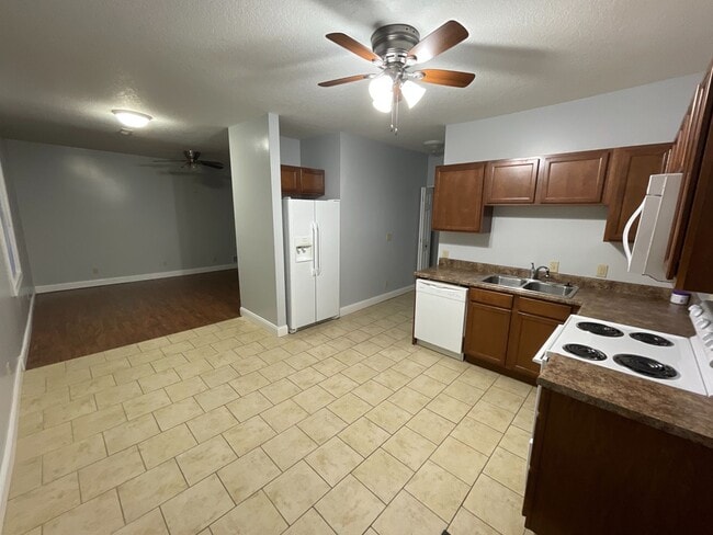 Building Photo - 3 large bedrooms with large closets & 2 fu...