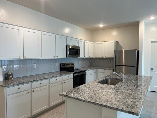 Building Photo - 4466 N 100th Dr