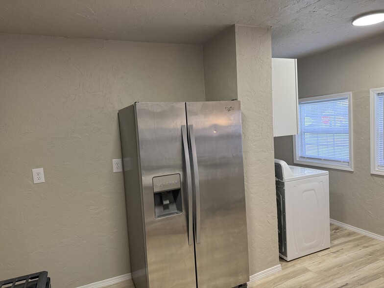 Kitchen with included refrigerator - 2200 NW 33rd St