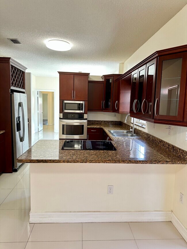 Building Photo - 5773 NW 99th Ave