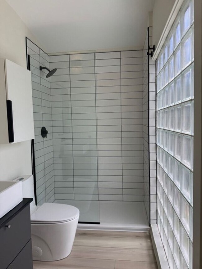 Building Photo - Vaulted Ceilings & Hardwood Floors in This Charming Indianapolis L
