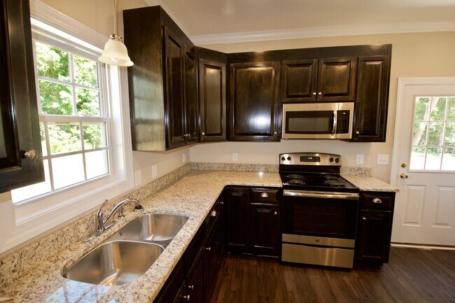 Building Photo - "Brand New Construction."  Quiet location, charming, cozy 3 bedroom duplex