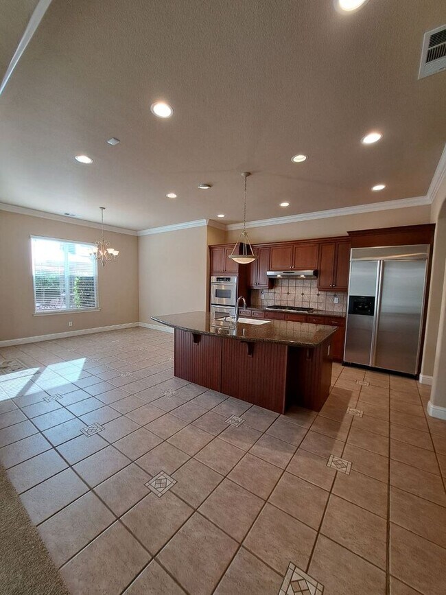 Building Photo - PRICE REDUCED TO $3795 – Custom Clovis Residence in Gated Community | Spacious Layout & 3-Car Gar...