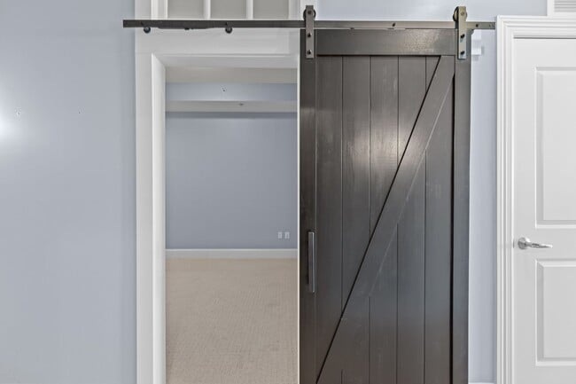 Building Photo - Modern 1-Bedroom with Downtown Raleigh Skyline Views