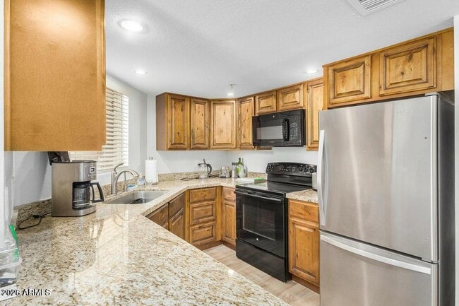 Building Photo - 4850 E Desert Cove Ave