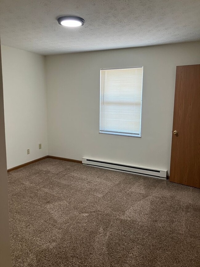Building Photo - Spacious 2-Bedroom Living in a Quiet Commu...