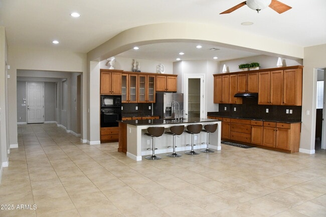 Building Photo - 9539 W Harmony Ln