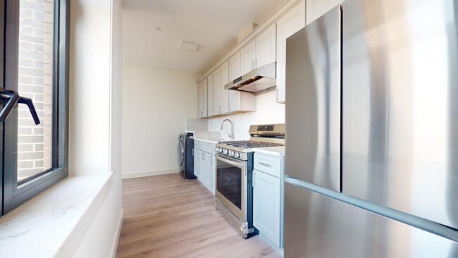 Building Photo - 63-68-68 Austin St