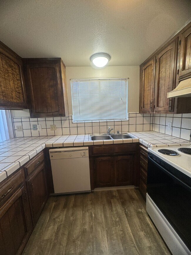 Building Photo - Two Bedroom Townhome Available For Immedia...