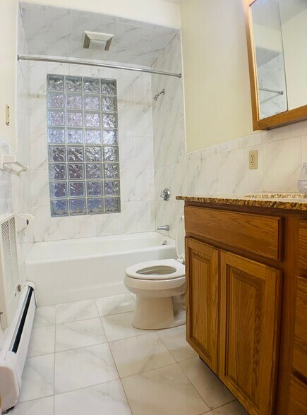 Tile bath with exta heater - 71 Baldwin St