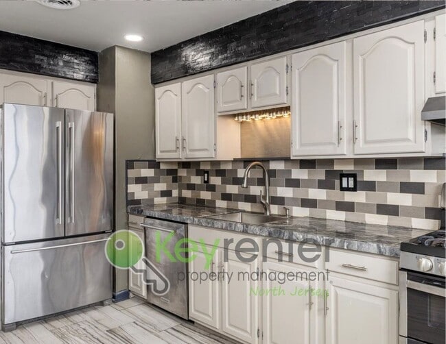 Building Photo - Modern 3-Level Townhome with River Views in Wallington