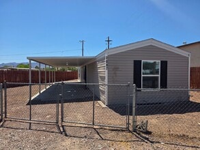 Building Photo - Cute, Clean & Affordable 3 Bed / 2 Bath Home in Central Bullhead City!