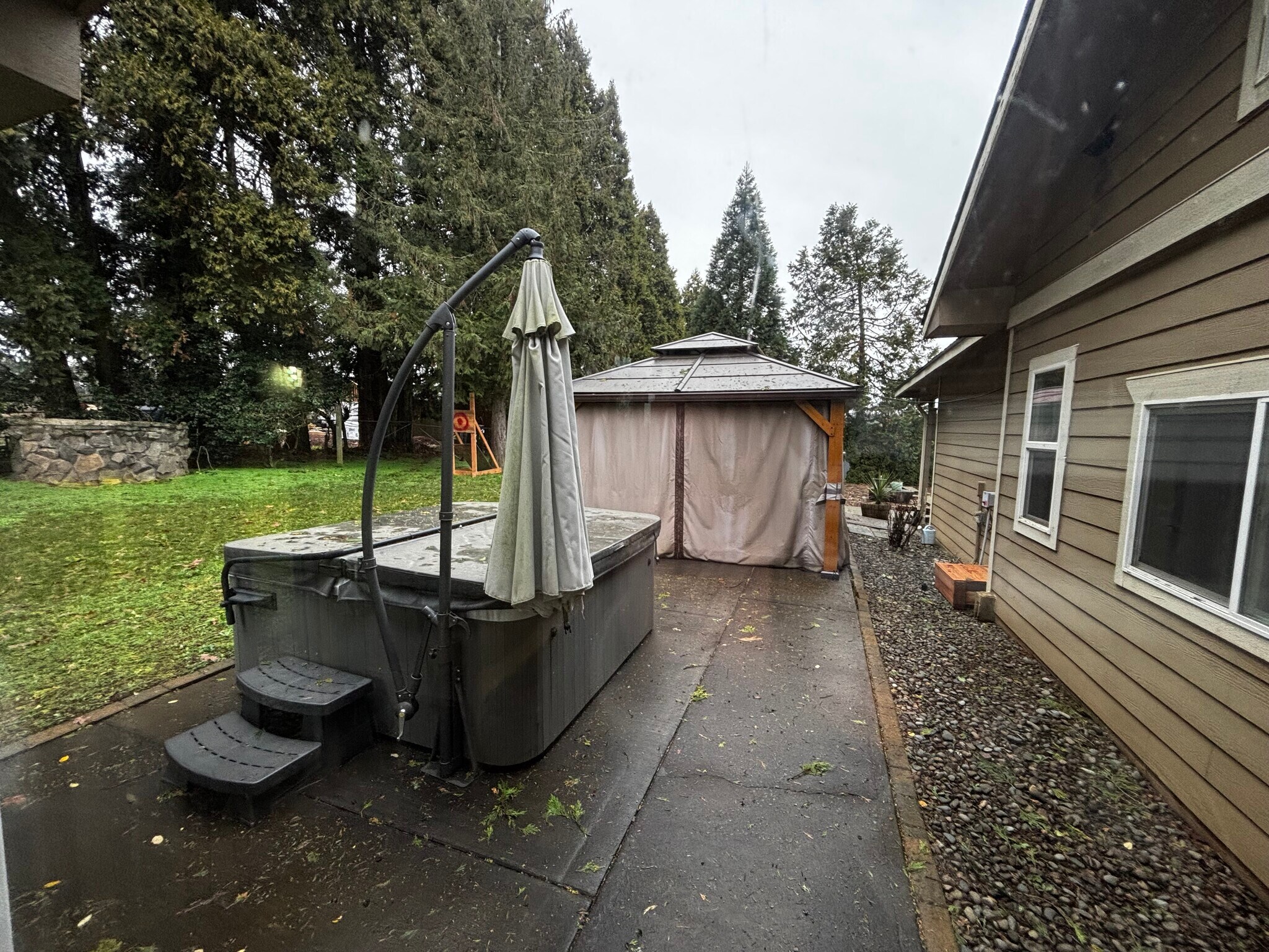 Hot tub and gazebo - 6971 Rainbow Dr SE