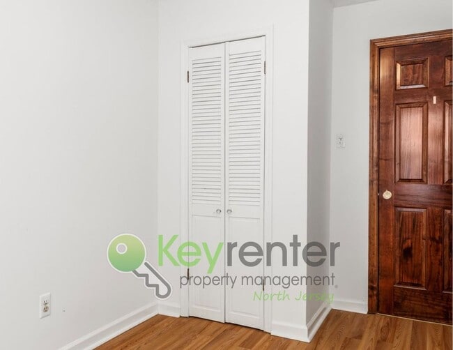 Building Photo - Spacious 3-Bed, 2-Bath Nutley Home with Bonus Office, Multi-Level Deck & Quiet Location