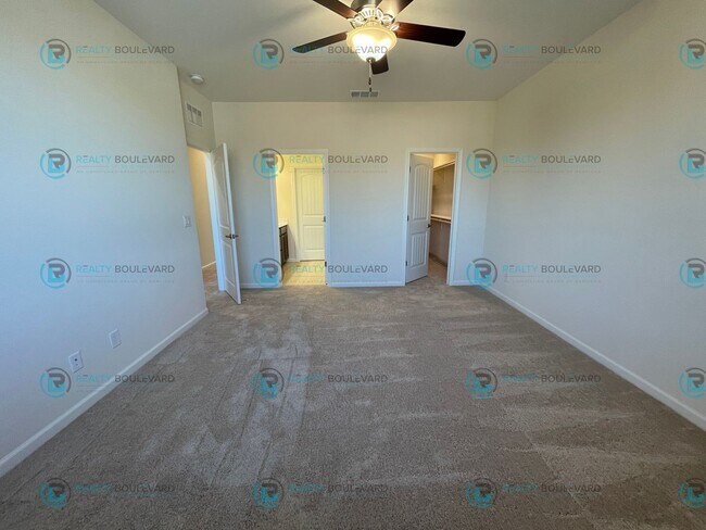 Building Photo - Luxury and Convenience Fully Equipped 3-Bedroom 2.5 Bathroom 2 Car Garage Townhome in Carson City