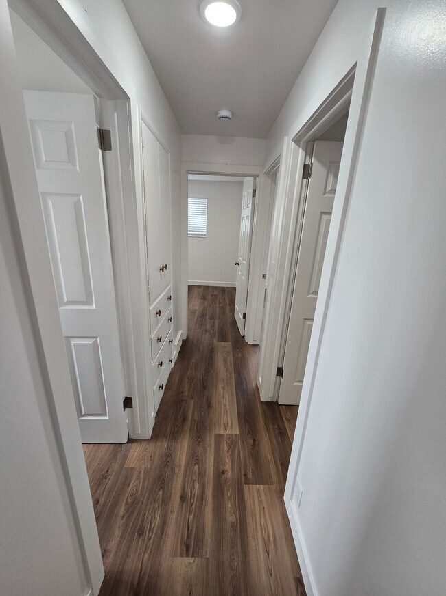 Building Photo - Remodeled 4 Bed, 2 Bath with Double Kitchen & Covered Carport