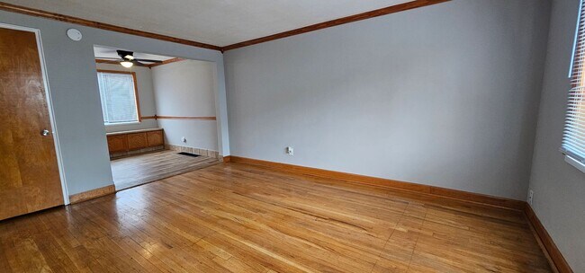 Building Photo - Beautiful 2BR/1BA Townhome with Attached Garage and W/D Hookups